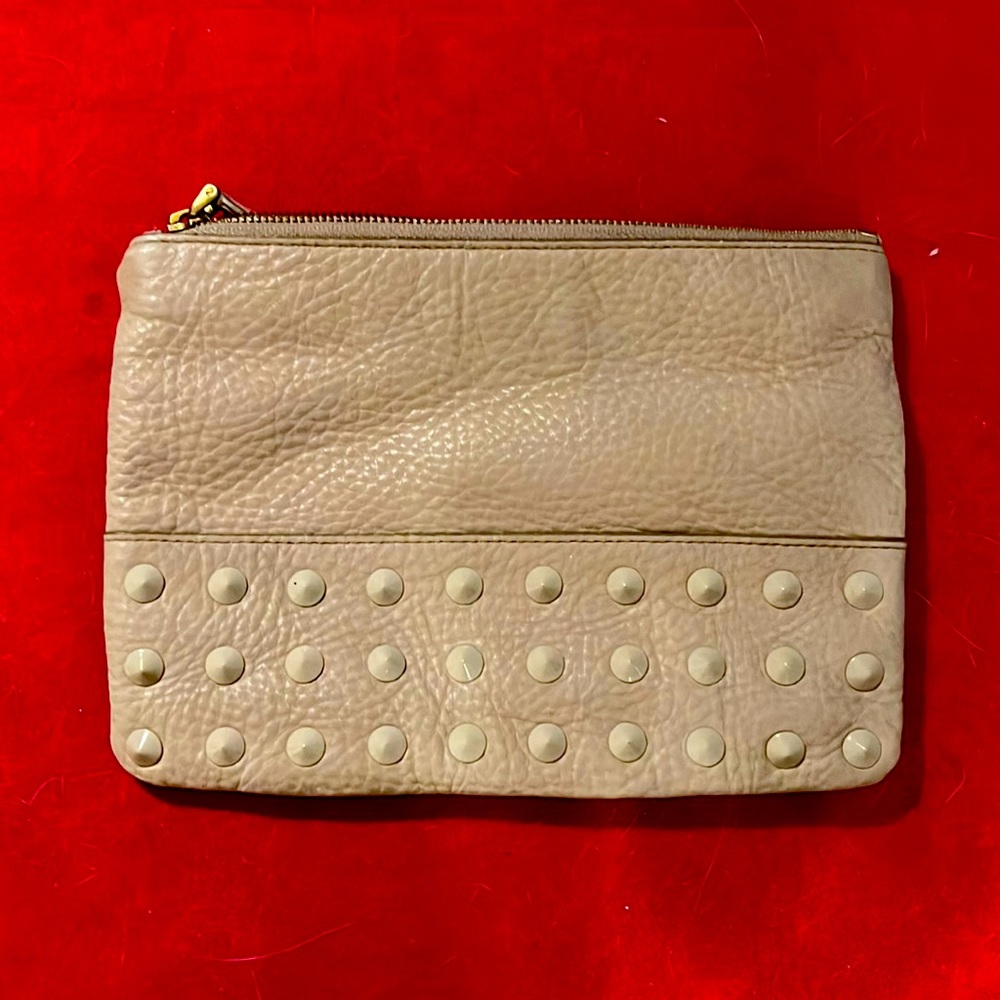 J. Crew taupe pebbled leather clutch with studs. 6in by 9in. Lightweight.